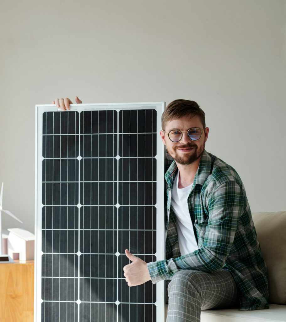 happy Man with Solar Panel